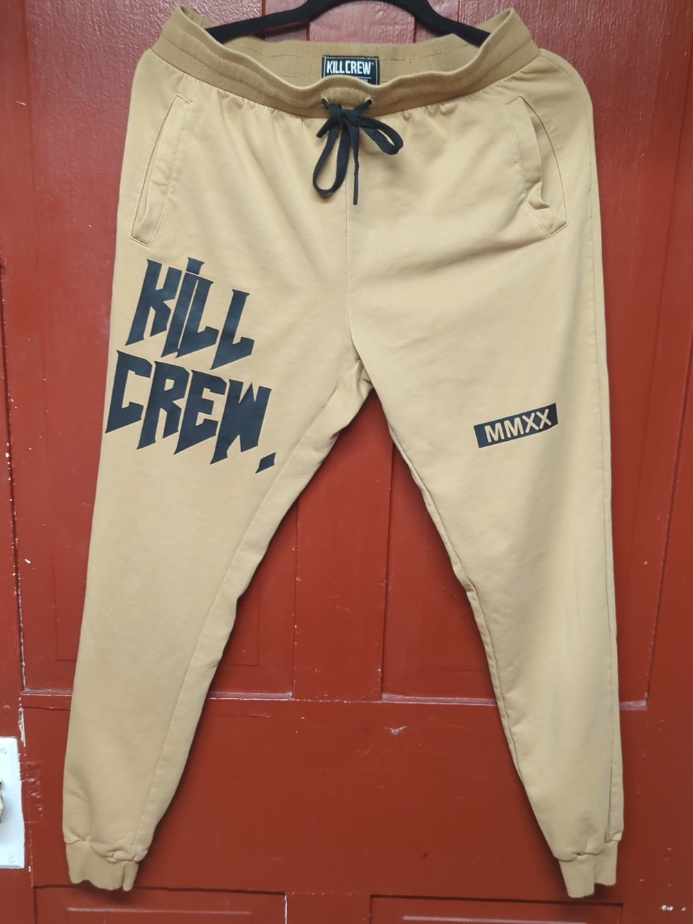 KILL CREW Tan Joggers with Black Logo Print